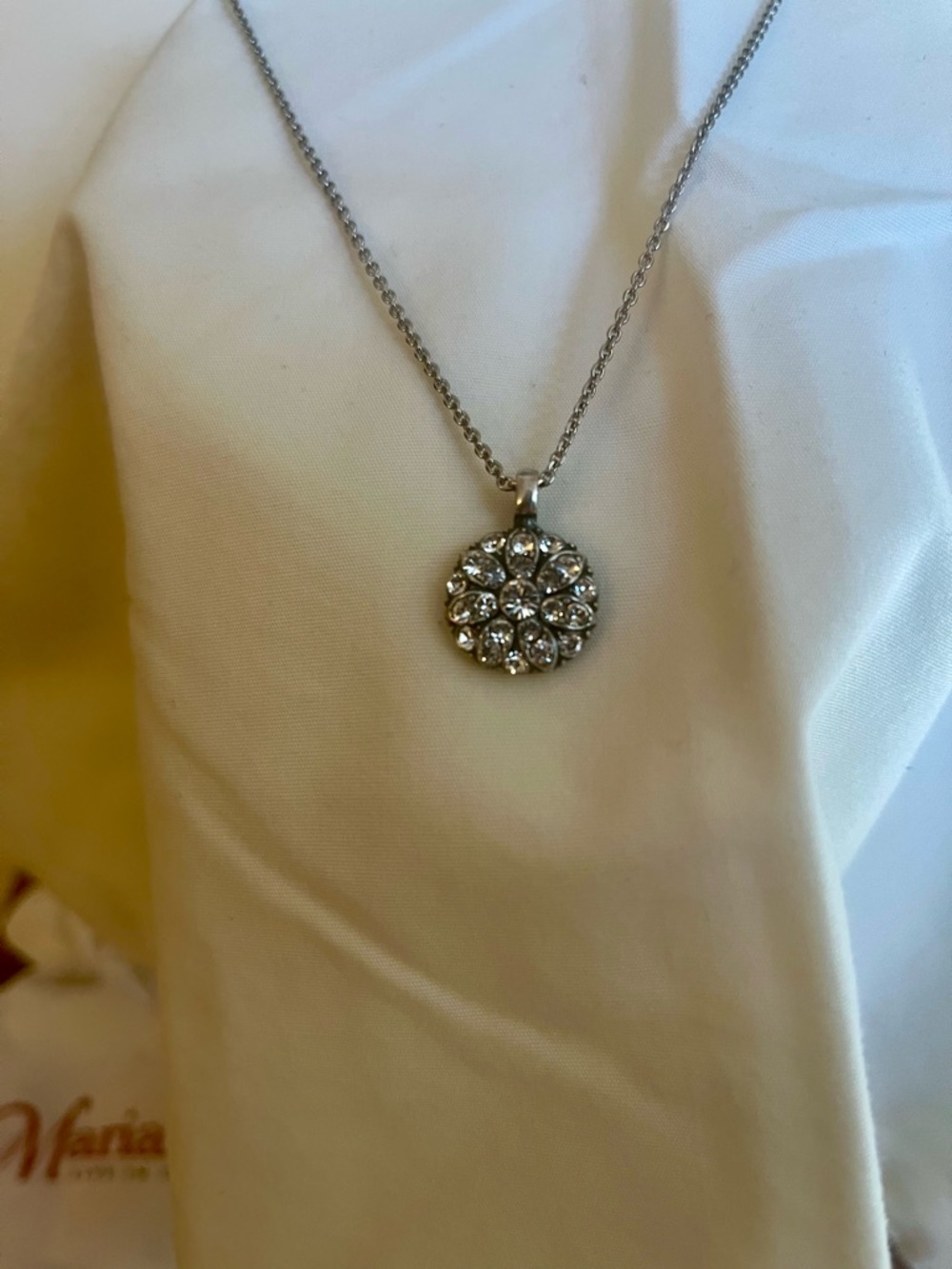 Mariana Silver Crystal Floral Pendant Necklace with matching earrings.